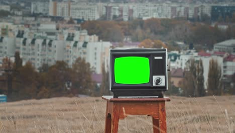 old television with green screen. aesthetics of the 80s.