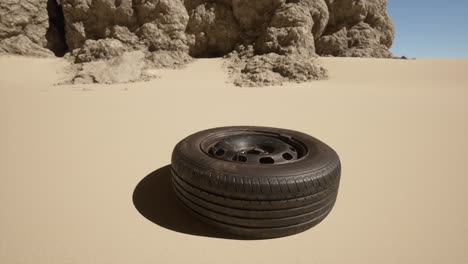 a single tire in the desert