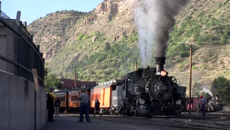 a steam train at the station