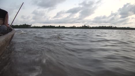 riding fast on a pirogue in africa