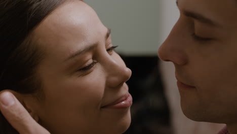 couple closely gazing at each other