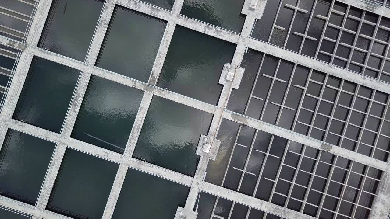 Aerial View Over Water Treatment Tanks Facility
