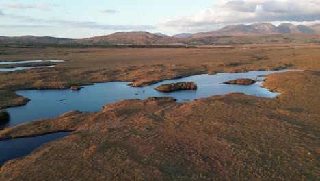 aerial of connemara, a region of immense natural beauty in ireland, renowned for its abundance of rushing rivers, tranquil lakes, reflections of a pristine and unspoiled wilderness