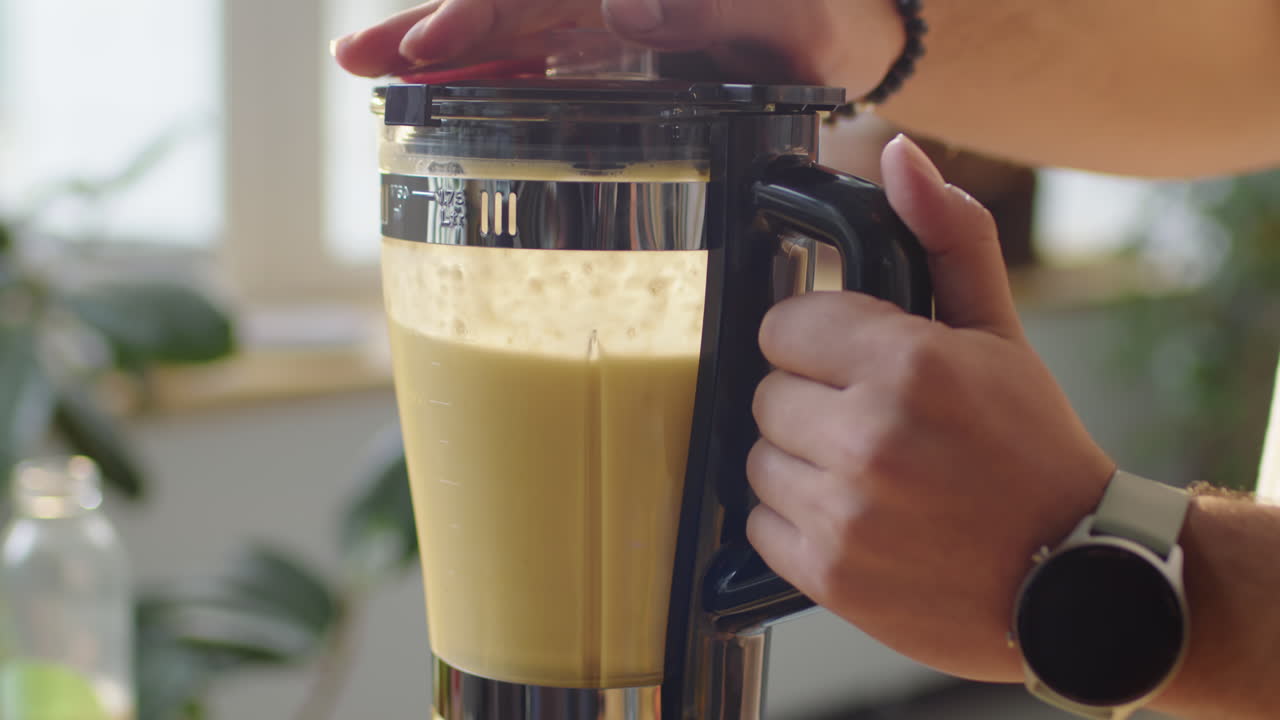 Preparing Fruit Smoothie in Blender