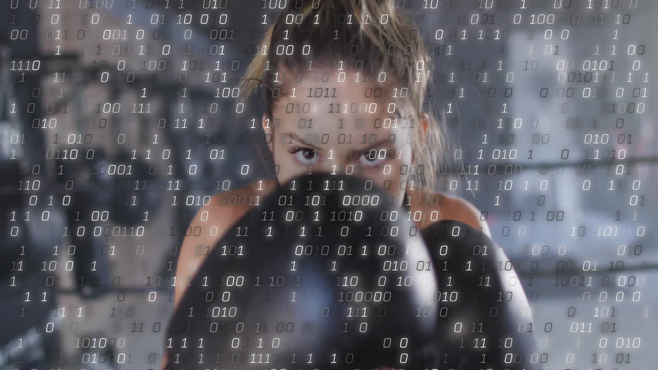 animación de codificación binaria sobre mujer caucásica usando guantes de boxeo en el gimnasio