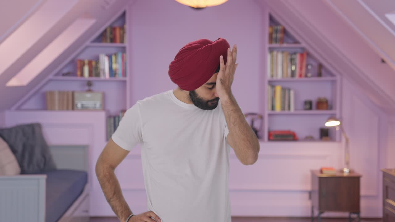 Sad and upset Sikh Indian man