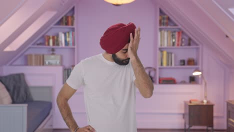 sad and upset sikh indian man