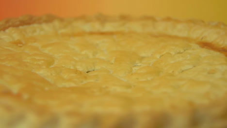 [Camera-Used:-Canon-C300]-Close-up:-rotating-golden-pie-crust