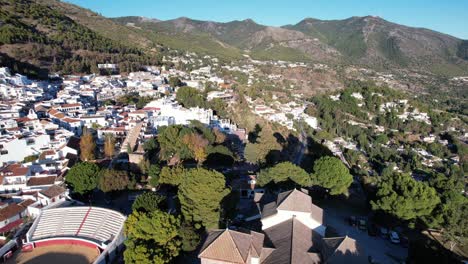 aerial reverse dolly over quiet neighborhood of mijas pueblo spain