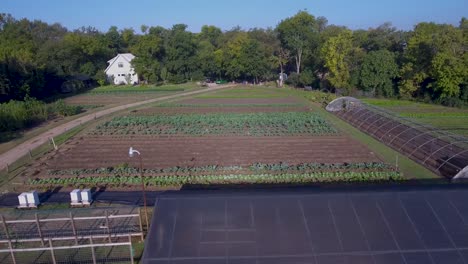 aerial: pan across a local farm in austin, texas