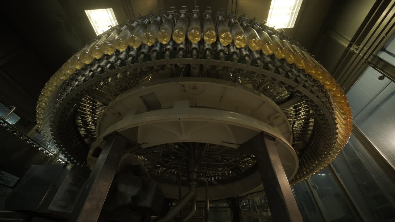 Automated Bottle Filling Machine in a Beverage Factory