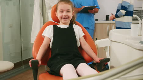 Portrait-of-girl-patient-looking-at-camera-and-laugh