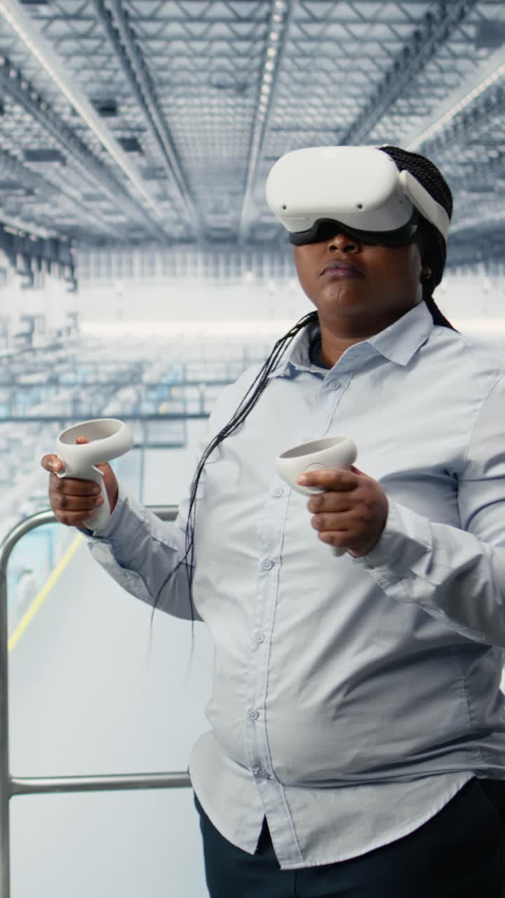 Vertical video Woman reviews microchip factory equipment diagnostic readouts using VR