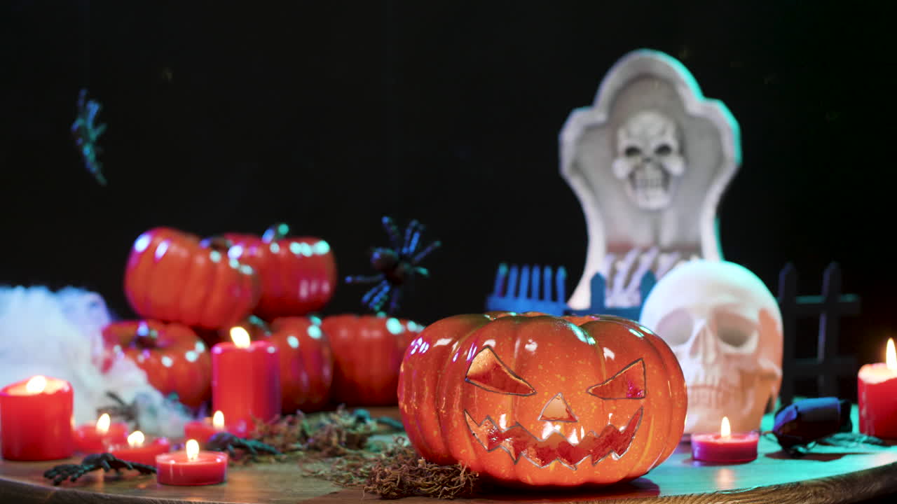 Halloween Scene with Pumpkins, Skull, and Candles