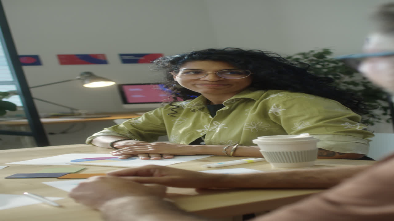 Latin Businesswoman Holding Team Meeting