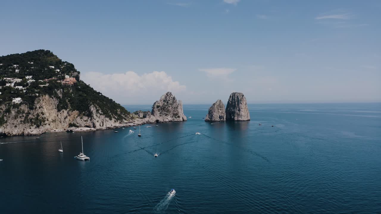 Wide aerial view of Capri, Italy's tranquil waters on a mid summer day