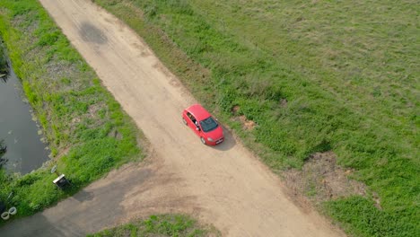 Car-Driving-Off-Road-On-Rural-Landscape-Of-Norfolk-In-UK