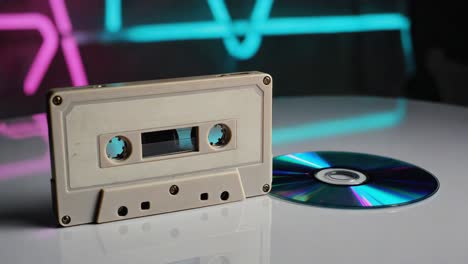 audio cassette and compact disc with neon lights