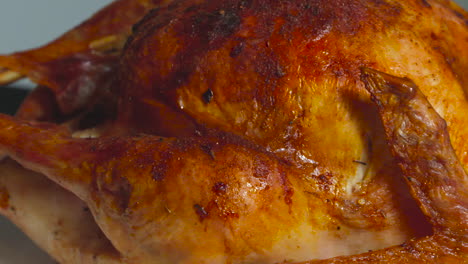 Close-up,-delicious,-cooked,-roasted-turkey-and-veggies-for-Thanksgiving-dinner