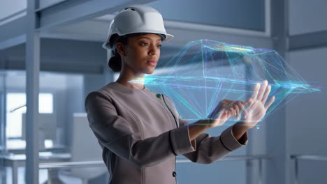 woman interacting with holographic augmented reality display in modern office