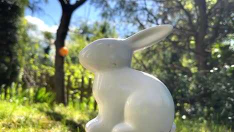 white porcelain rabbit in good spring weather