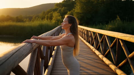 woman relaxing on a wooden bridge in nature