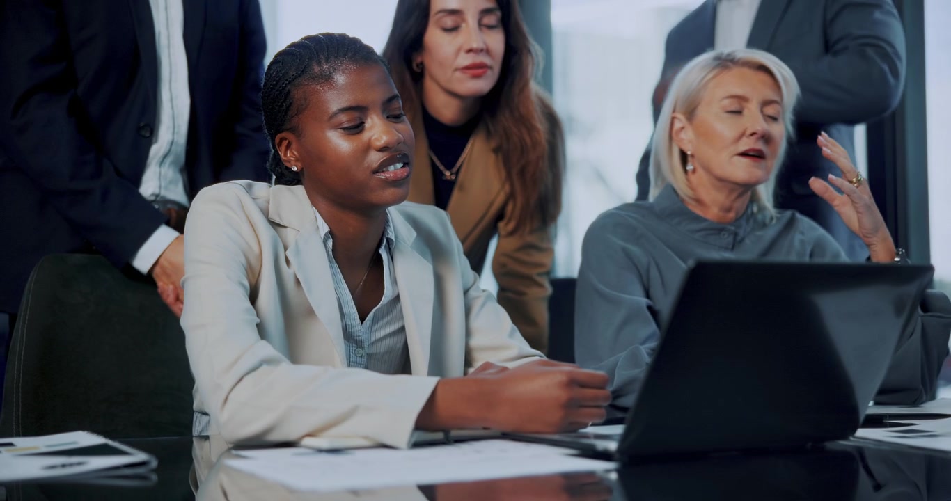 Diverse Business Team Collaborating and Feeling Stressed During Office Meeting