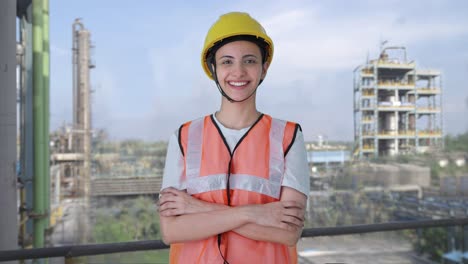 portrait of happy indian female construction worker