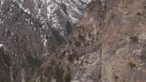 majestic aerial view of snow-capped mountains and rugged cliffs in british columbia, canada