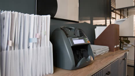 organized office workspace with bill counter