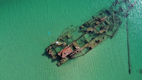 unveiling the beauty of epanomi shipwreck and beach on a greek summer day with radiant sunshine and waves