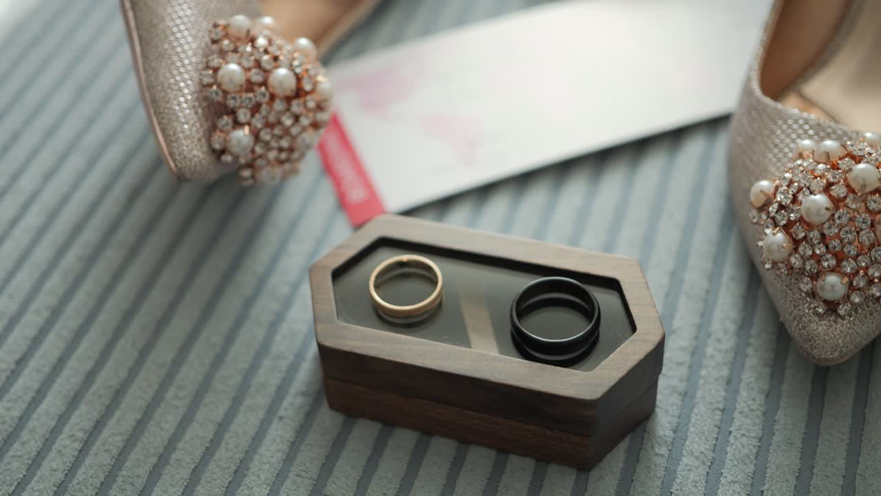 Two yellow and black gold jewelry rings