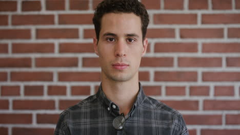 portrait-serious-young-hispanic-man-looking-calm-successful-male-student-real-people-series