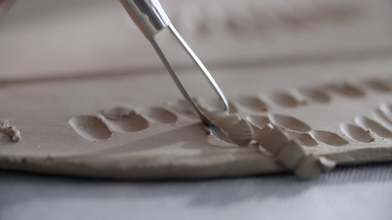 Close-up view of ceramic artwork in progress