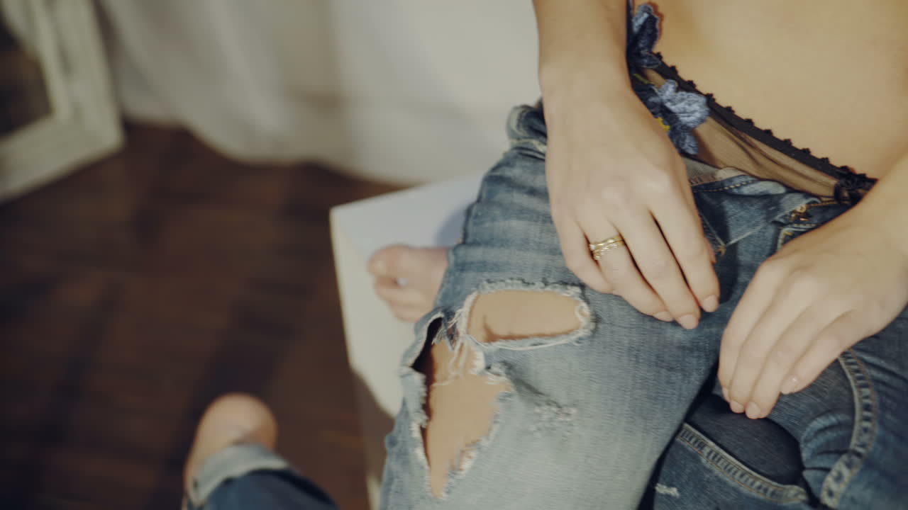 Woman in Jeans and Lingerie