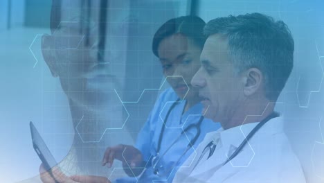 multiple exposure of molecular structure with male and female doctors discussing in background