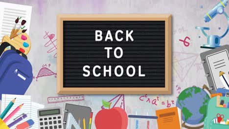 Zurück-Zur-Schule-Text-Und-Mehrere-Schulsymbole-Vor-Weißem-Hintergrund