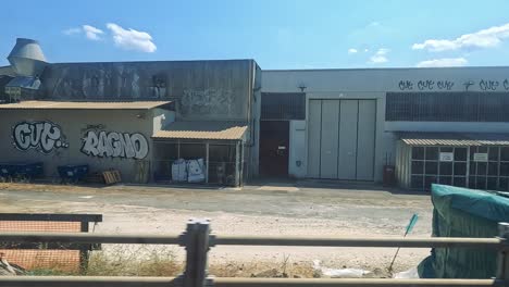 urban scenery with graffiti and industrial buildings