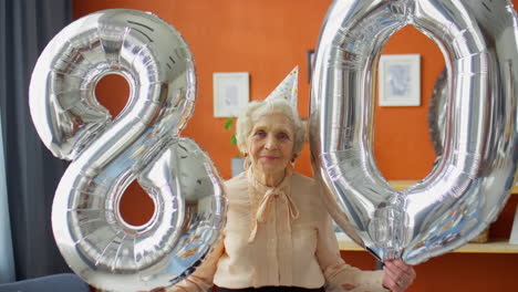 woman celebrating her 80th birthday