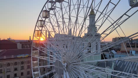 kyiv, ukraine in the morning at dawn: ferris wheel