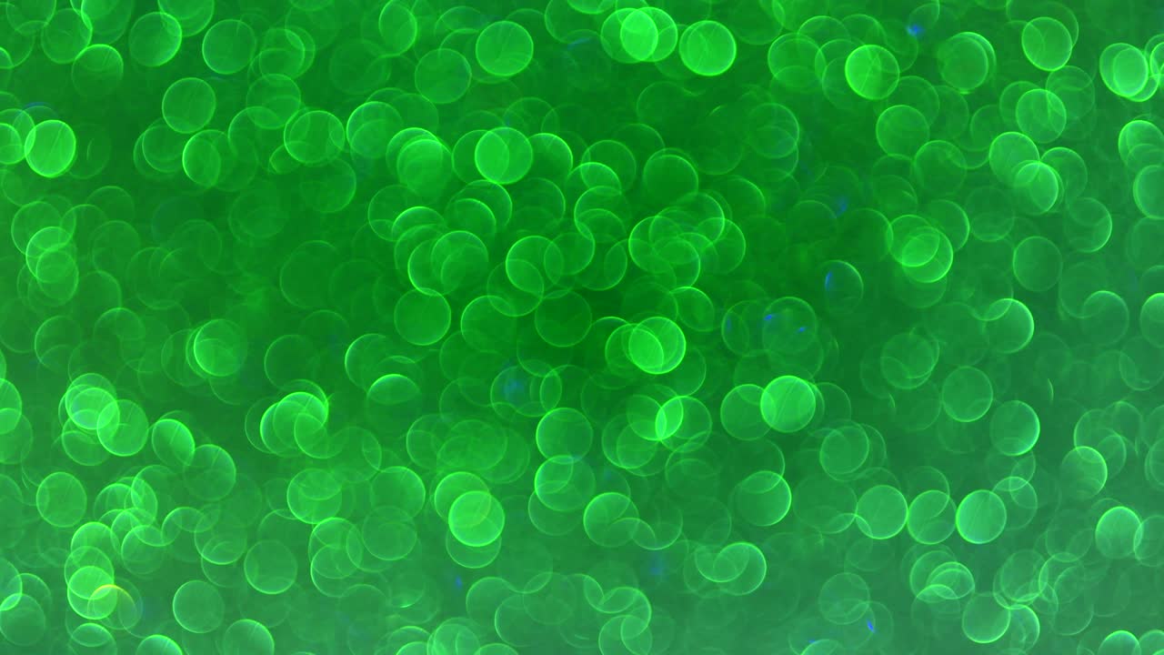 fondo de movimiento abstracto círculos dorados brillantes. tarjeta festiva.