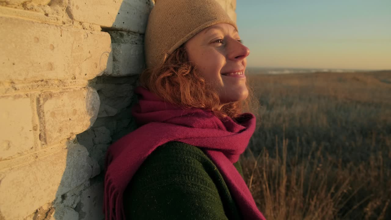 Woman Contemplating Sunset at the Beach