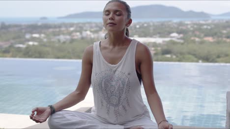 adult lady practicing yoga while resting at resort