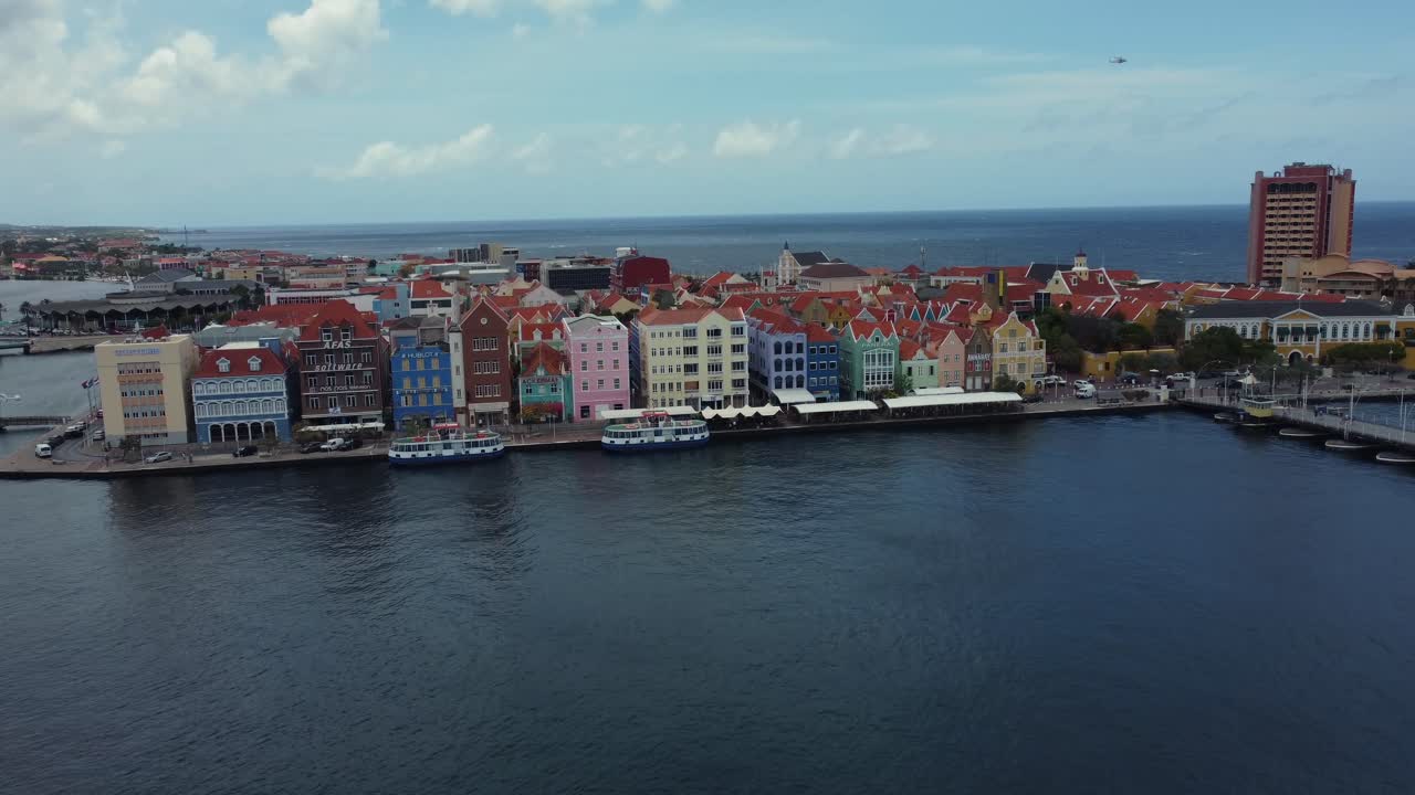 Approaching Historic Colorful Waterfront Buildings in Curacao