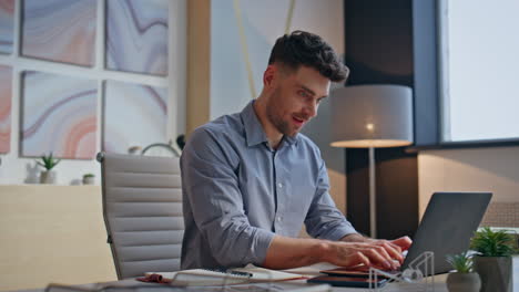 cheerful author writing notebook working inspiration at private cabinet closeup