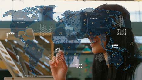 using virtual reality headset, person viewing animation with global map in school