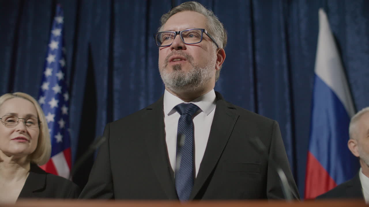 Government Spokesman Addressing Media at International Press Conference