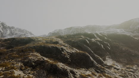 lanscape with barren mountain which is covered with ice