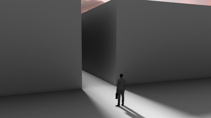 Businessman at entrance of maze