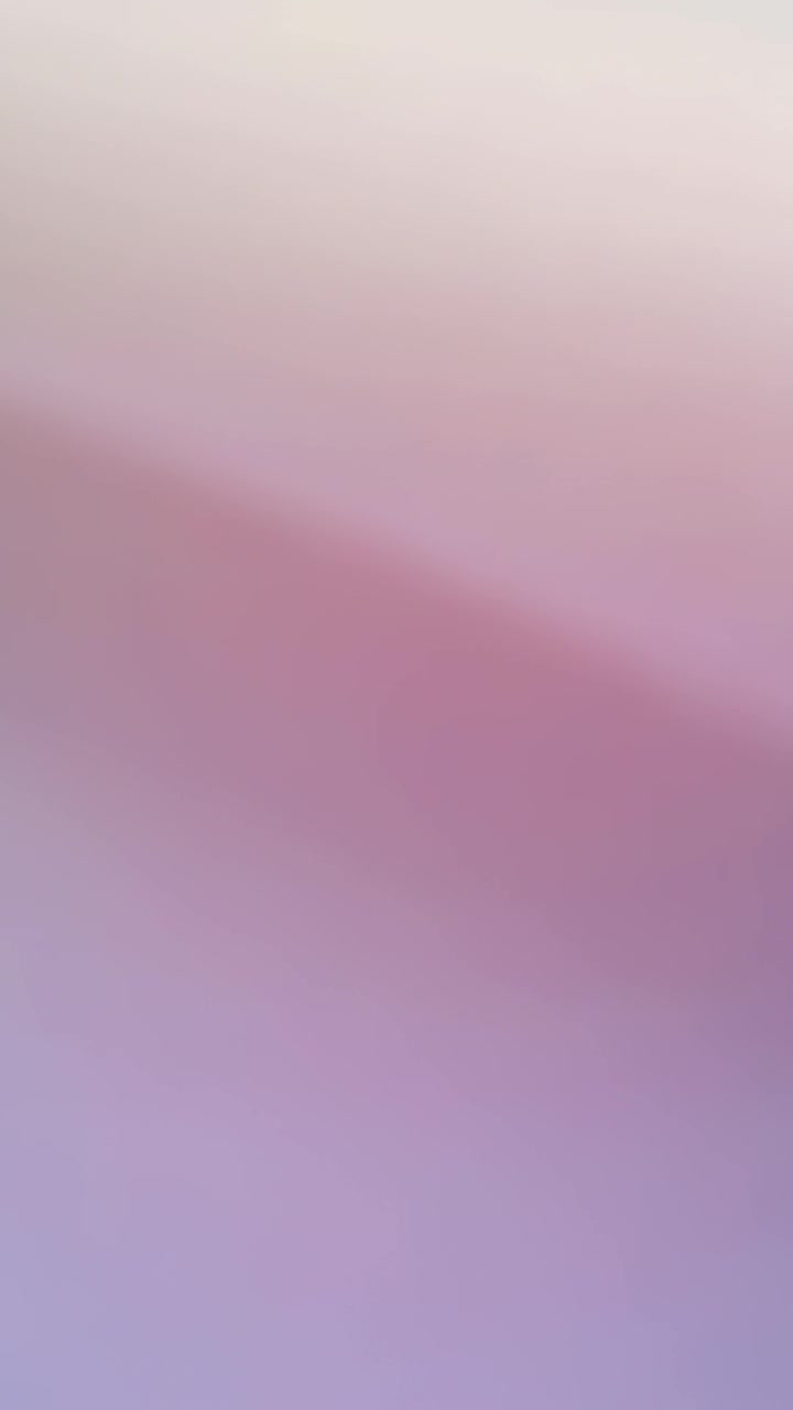 Vertical video: Shifting pastel gradient responding to focus shift on camera, showing soft banding